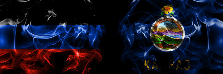 Donetsk People's Republic vs United States of America, America, US, USA, American, Kansas flag. Smoke flags placed side by side isolated on black background.