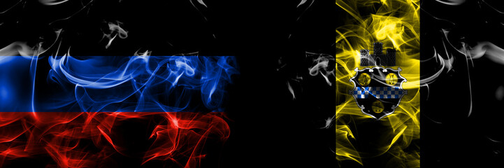 Donetsk People's Republic vs United States of America, America, US, USA, American, Pittsburgh, Pennsylvania flag. Smoke flags placed side by side isolated on black background.