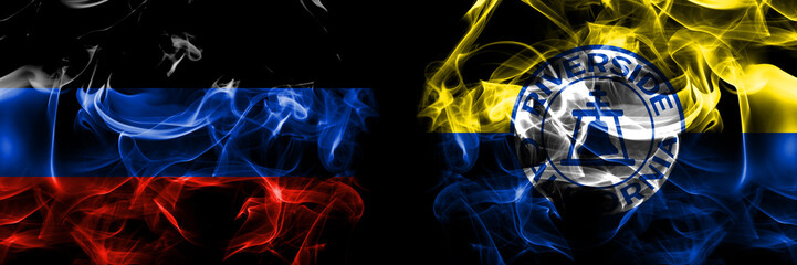 Donetsk People's Republic vs United States of America, America, US, USA, American, Riverside, California flag. Smoke flags placed side by side isolated on black background.