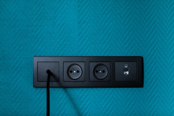 Electrical household switches and sockets close up. Minimalist interior design. Stylish bedroom and living room- Image