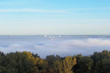 Morning fog over the city and the river.