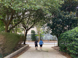 A father and son walking in the Buckhead district of Atlanta, GA.