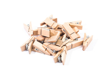 small wooden clothespins on white background - Image