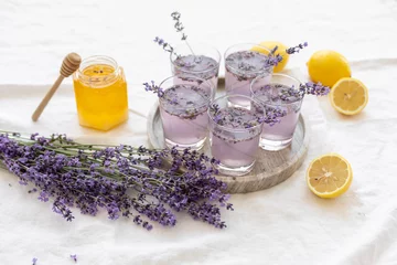 Fotobehang Honey and lavender bouquets. Virus treatment concept. Wooden table. © Kotkoa