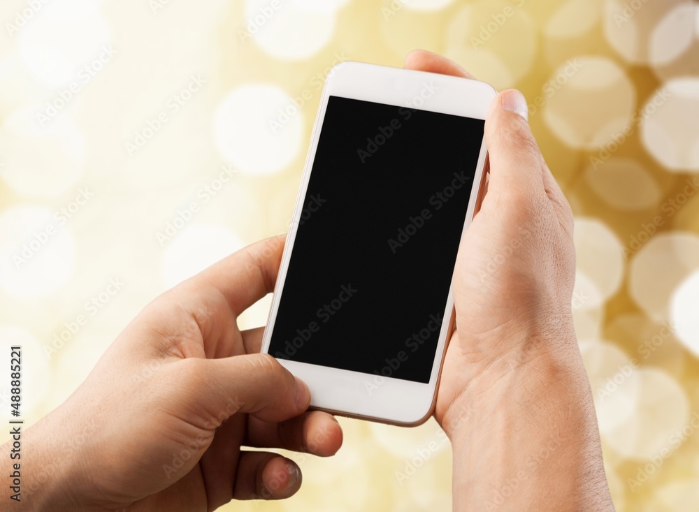 Poster Human hand using smartphone with a blank screen