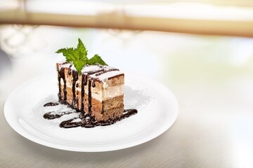 Tasty sweet cake on a white plate
