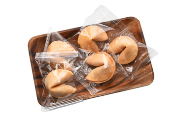 A plate full of fortune cookies still wrapped in plastic, isolated on white.