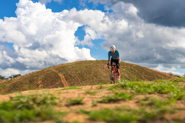 Cyclists practicing on gravel roads