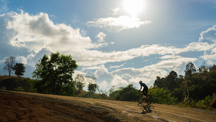 Cyclists practicing on gravel roads
