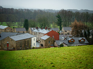 Old English village in rainy winter weather 