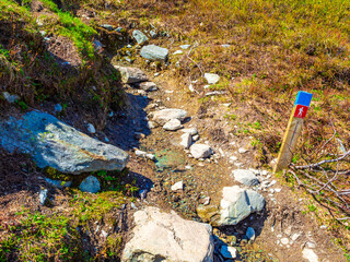 Trekking path to Veslehødn Veslehorn mountain Hydnefossen waterfall Hemsedal Norway.