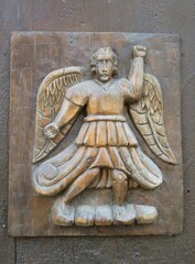 wooden sculpture of an angel