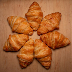 closeup square display crescent rolls breakfast butter fresh baked pastry desert bakery roll food sweet snack