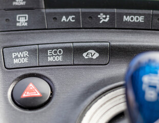 Electric hybrid car center console with various buttons