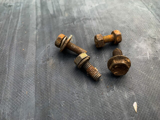 rusty bolts on a gray background
