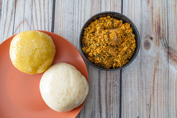 Pounded Yam and Garri Eba served with Egusi Soup ready to eat