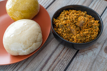 Pounded Yam and Garri Eba served with Egusi Soup ready to eat