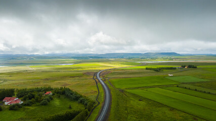Summertime aerial view of farmland agricultural fields at South Iceland