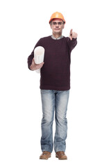 man in a protective helmet with drawings of a new project