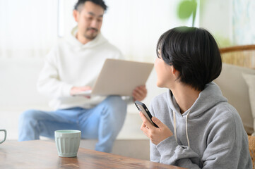 A couple relaxing in the living room