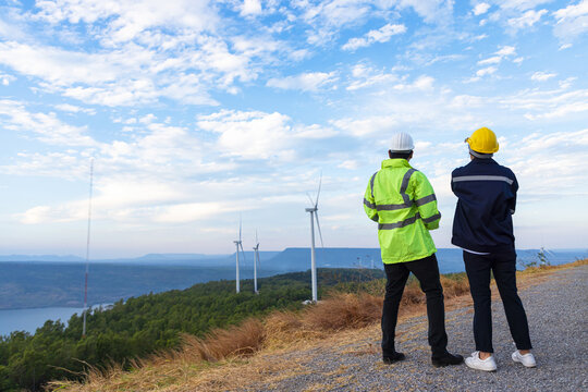 Engineers analysis windmill engineers inspection and progress check wind turbine.