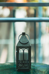 Fototapeta na wymiar lantern in the window table candle miami 