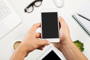 Concept NFT marketplace on a mobile phone. Hand with a blank smartphone
