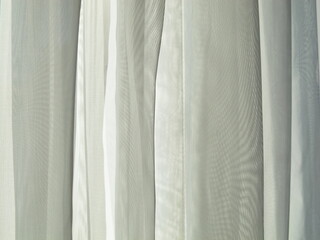 Blurred image of light and shade on interior window and wall curtain background. 