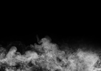 Smoke over black background. Fog or steam texture.