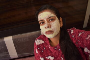 Indian Woman applied Neem face mask for pimple free skin