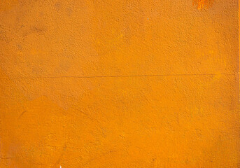 Abstract yellow cement wall texture and background. Modern grafitty wallpaper. A wall have some grunge effects and lines.