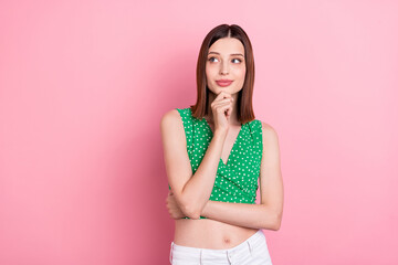 Photo of young adorable woman think wonder look empty space idea isolated over pink color background
