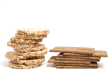 Wheat and rye bread on a white background,a popular product is delicious and healthy food.