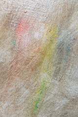 abstract faded multicolored background resulting from washing off paints from canvas, short focus. Not an art object, temporary effect.