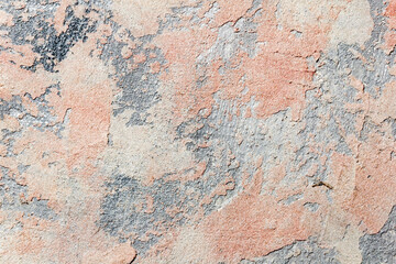 surface recouverte de plâtre décoratif avec un motif chaotique, des taches multicolores