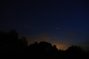 Obraz na płótnie Canvas Night sky. Stars and galaxies in the sky at dusk.