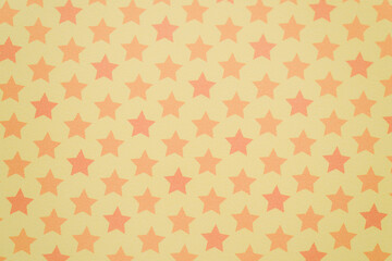 Orange star pattern with yellow background.