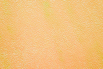Fototapeta premium The shining orange paper texture.
