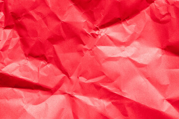 The crumpled red paper texture.