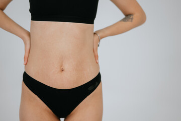 Plus size body positive brunette woman wearing comfortable underwear