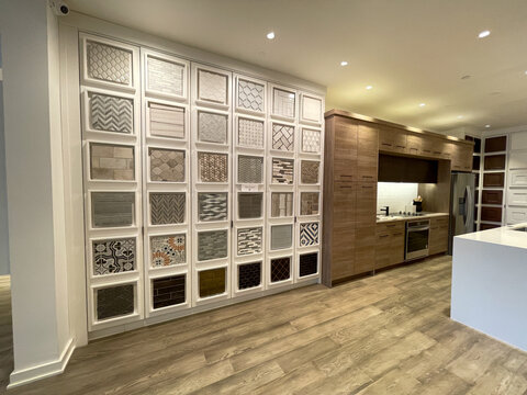 The tile style and color choices at a home builder design studio in Orlando, Florida.