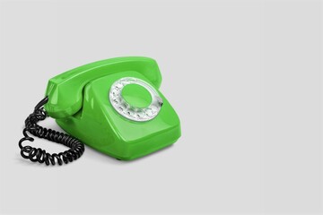 Bright colored retro or vintage classic iconic device home telephone handset for calls