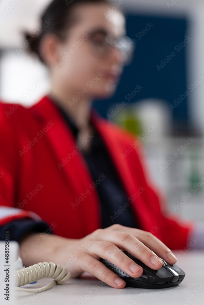 Aufkleber closeup of businesswoman using wireless computer mouse in startup office. entrepreneur with glasses 