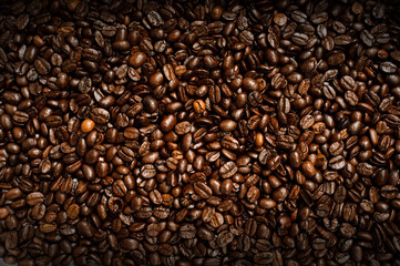 A mixture of different kinds of coffee beans. Coffee Background