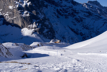 Aerial view of mountain panorama at the Swiss Alps seen from ski resort Engelberg, focus on...