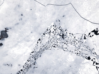 cracked ice on the frozen lake.
frozen lake and ice