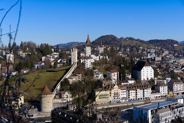 Aerial view over City of Luzern seen from local mountain Gütsch with medieval city wall and guard...