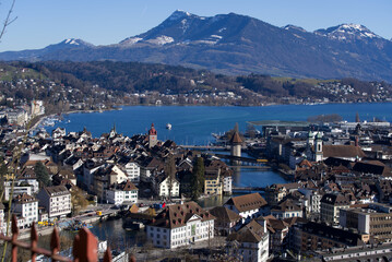 Obraz premium Aerial view over City of Luzern seen form local mountain Gütsch on a sunny winter day, focus on background. Photo taken February 9th, 2022, Lucerne, Switzerland.