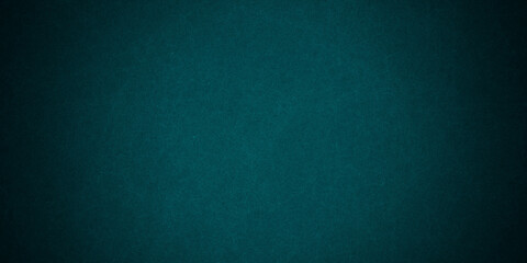 Dark blue background texture with black vignette in old vintage grunge textured border design, dark elegant teal color wall with light
