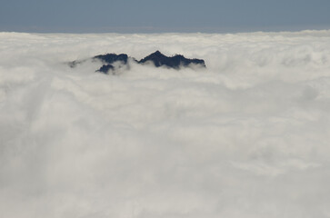 Crag in a sea of clouds. Caldera de Taburiente National Park. La Palma. Canary Islands. Spain.
